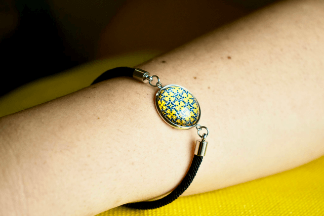 Bracciale unisex con cabochon e motivo a piastrella